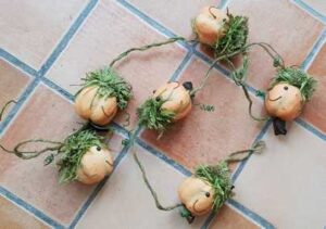Slinger met pompoenen