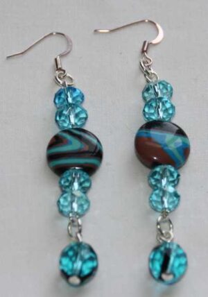 Oorbellen in blauw tinten met stenen
