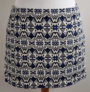 Divided beige rokje met zwart en blauw mt. 42