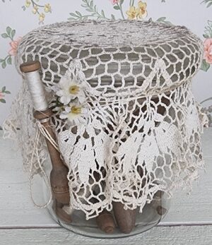 Glazen wekpot met klosjes