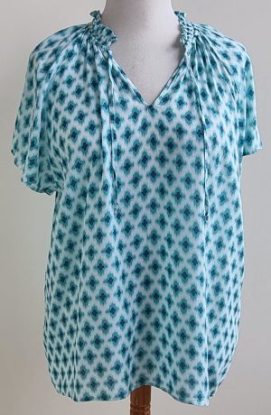 Yessica witte blouse met blauwe prints mt. 48