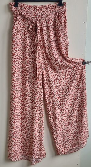 Hema zachtgrijze broek met wijde pijpen en print mt. M