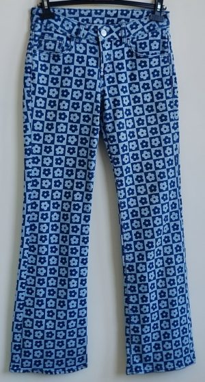 Divided stretchy jeans met bloemetjes mt. 36